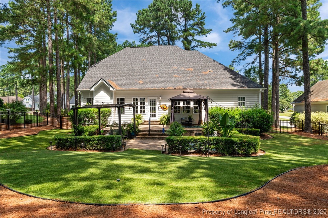256 Barons Run West Spring Lake, NC 28390 - Photo 14 of 44 a view of house with garden