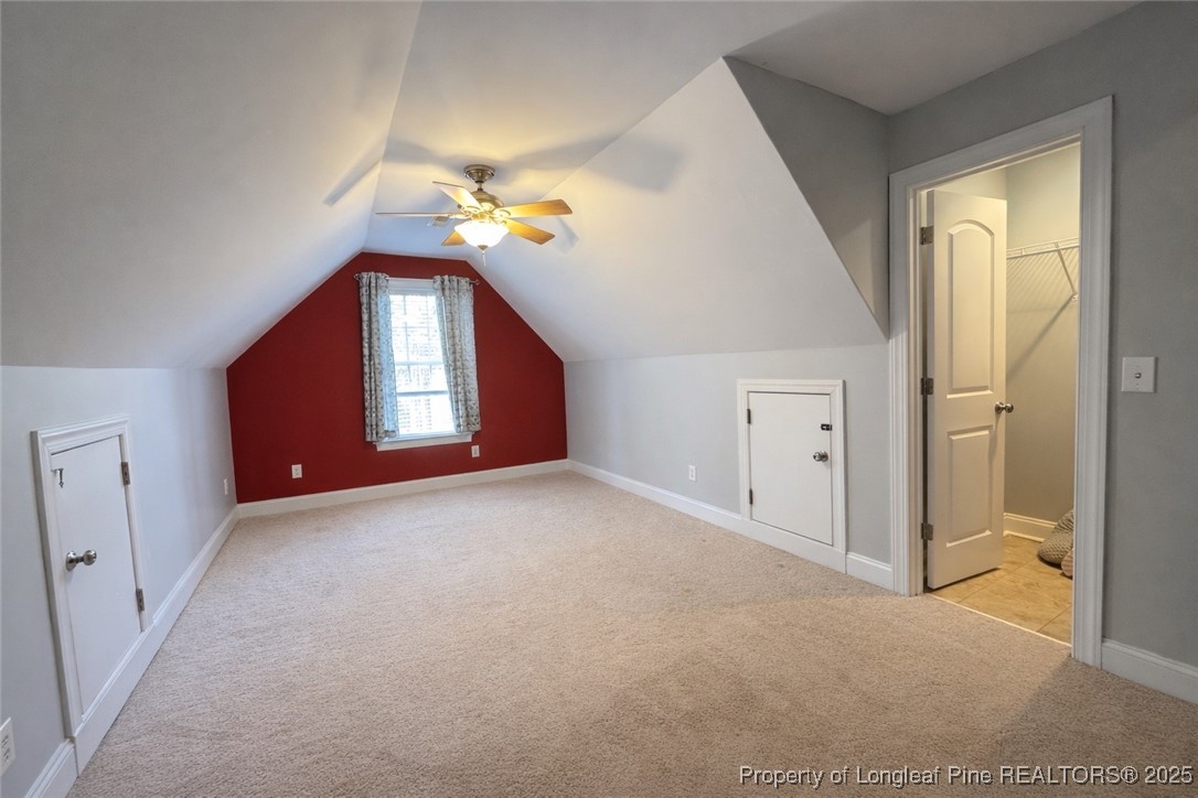 256 Barons Run West Spring Lake, NC 28390 - Photo 32 of 44 a view of an empty room with a chandelier