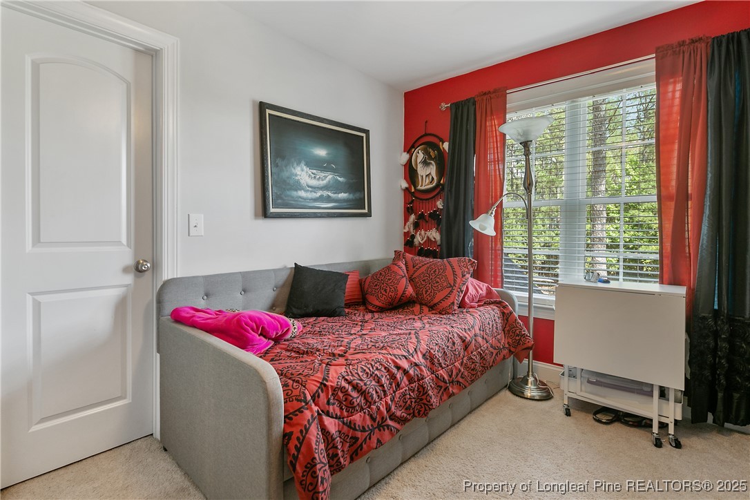256 Barons Run West Spring Lake, NC 28390 - Photo 33 of 44 a bedroom with a bed and a window