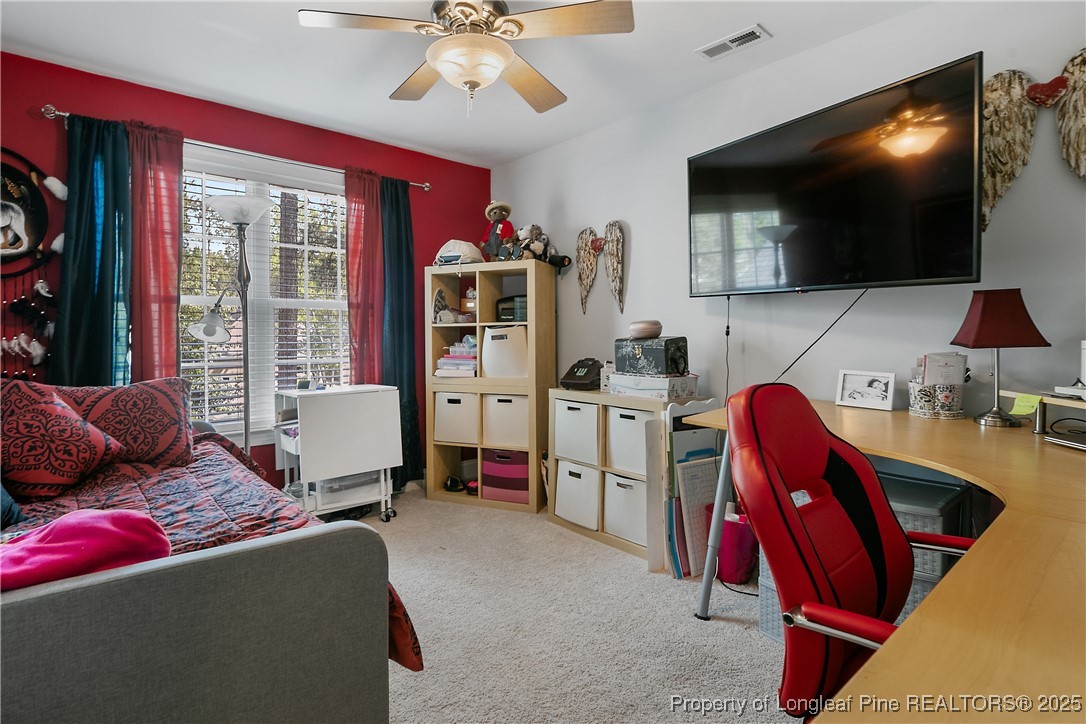 256 Barons Run West Spring Lake, NC 28390 - Photo 34 of 44 a living room with furniture and a flat screen tv