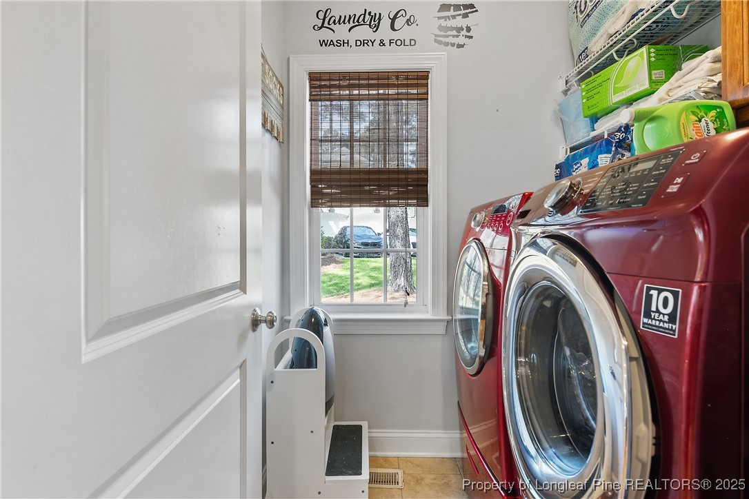 256 Barons Run West Spring Lake, NC 28390 - Photo 38 of 44 a utility room with dryer and washer