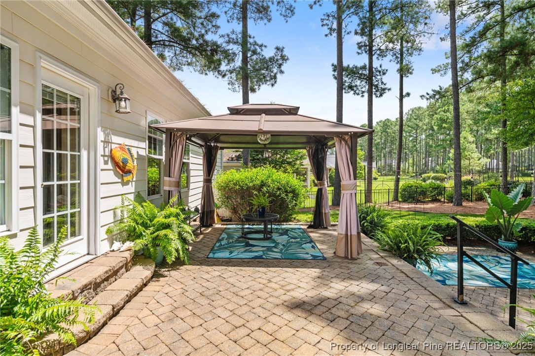 256 Barons Run West Spring Lake, NC 28390 - Photo 6 of 44 a front view of a house with garden