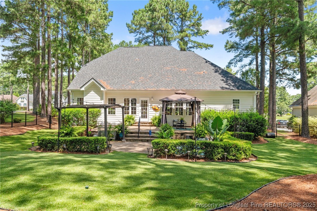 256 Barons Run West Spring Lake, NC 28390 - Photo 8 of 44 a aerial view of a house next to a big yard and large trees