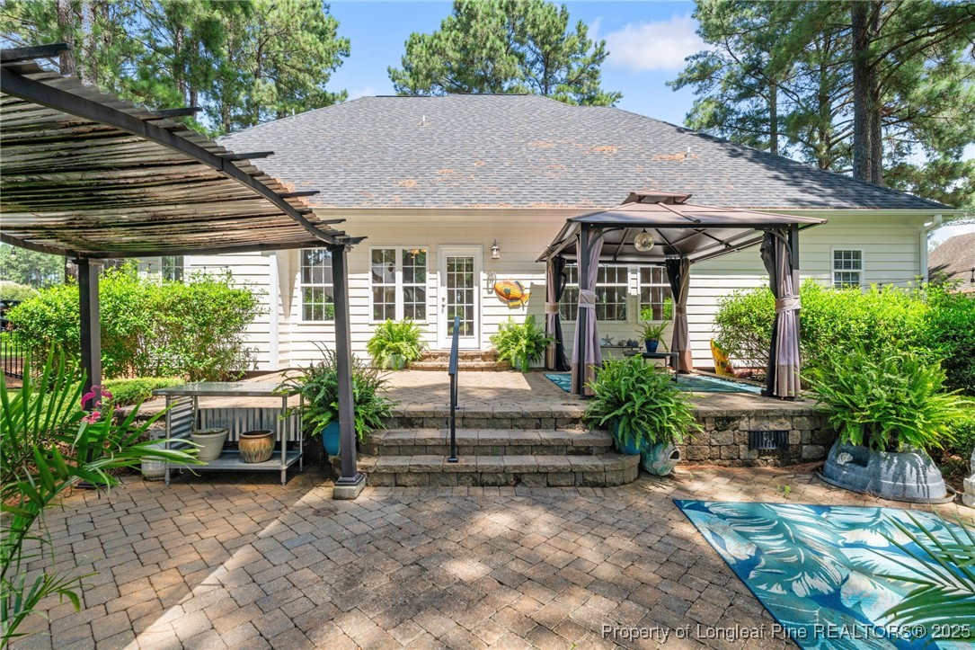 256 Barons Run West Spring Lake, NC 28390 - Photo 10 of 44 a view of a house with furniture and garden