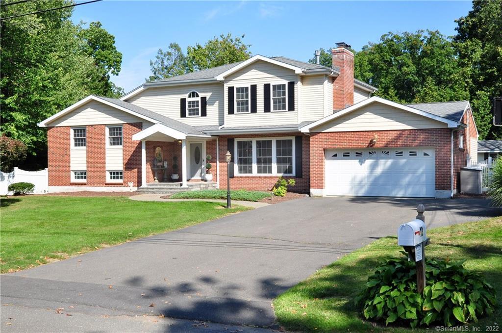 Gorgeous expanded and renovated Colonial Split in subdivision conveniently located in Farmington near shops, schools and amenities.