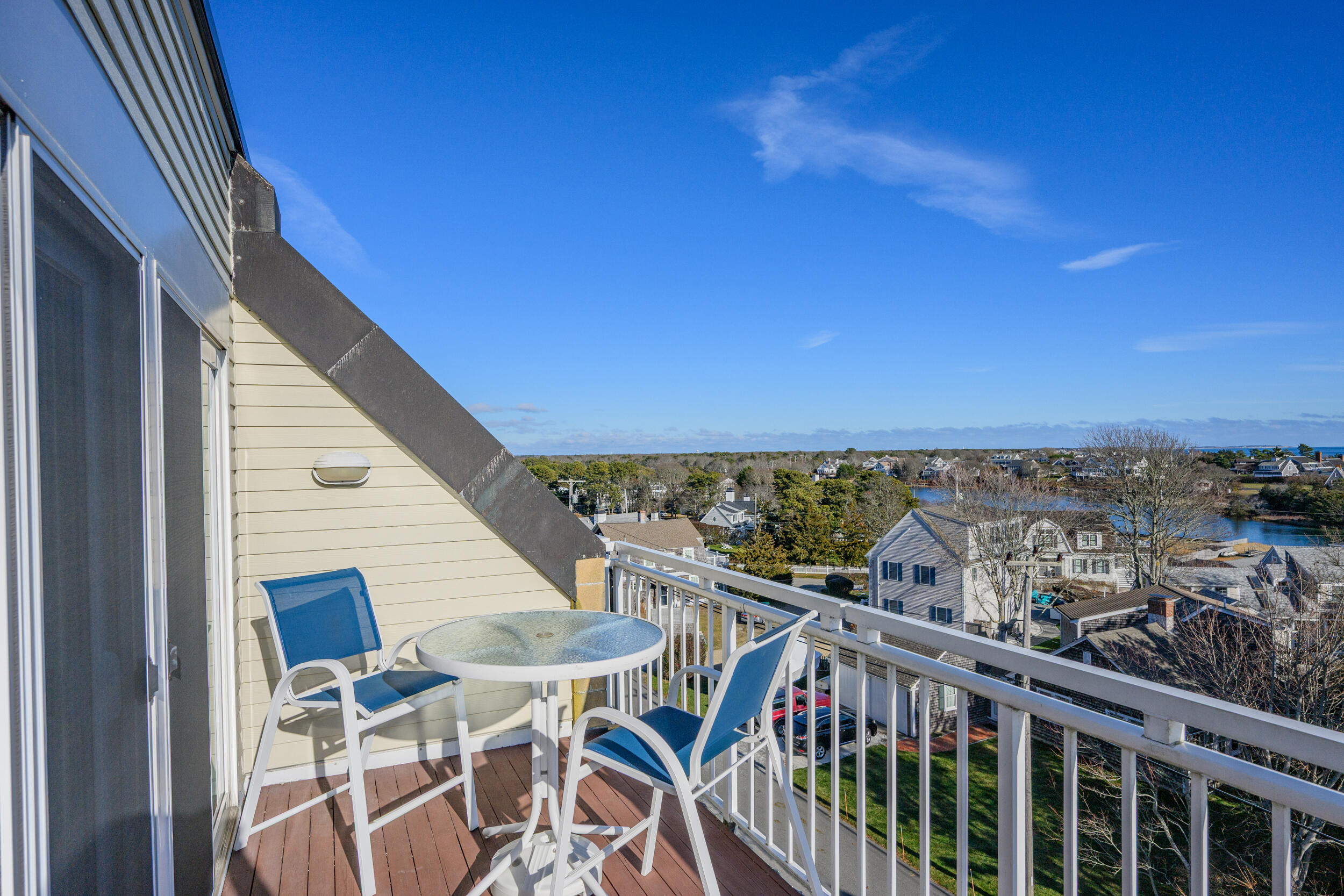 1 Belmont Road, Unit 541 West Harwich, MA 02671 - Photo 9 of 31 a view of a balcony with chairs