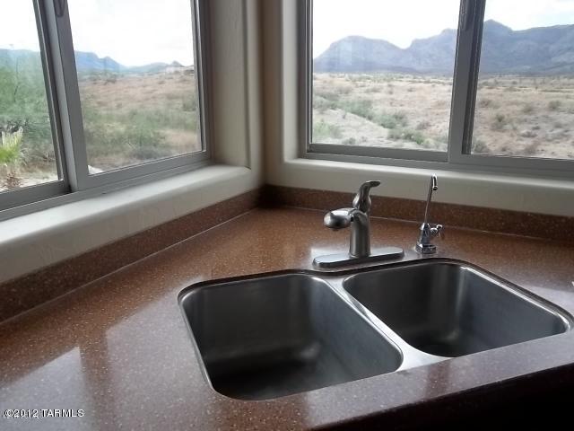 1490 Circulo Jacona Rio Rico, AZ 85648 - Photo 5 of 29 a close view of sink and a window