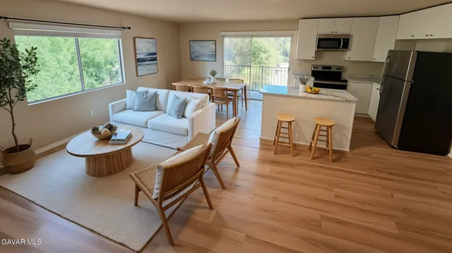 a bathroom with a sink a mirror and a shower