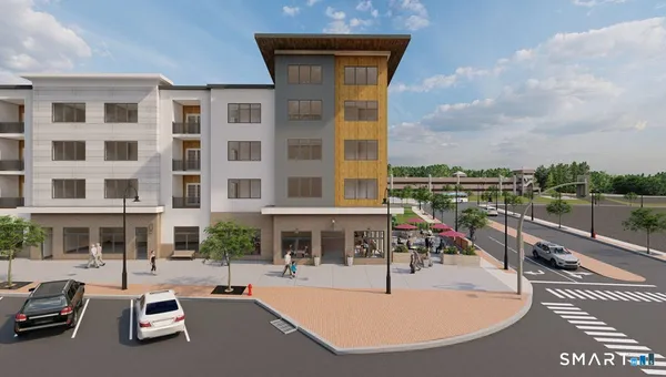 a swimming pool with outdoor seating and barbeque oven