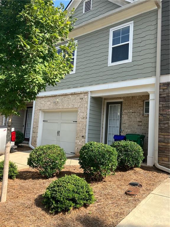 5243 Mill Way Stone Mountain, GA 30083 - Photo 1 of 1 a front view of a house with a yard