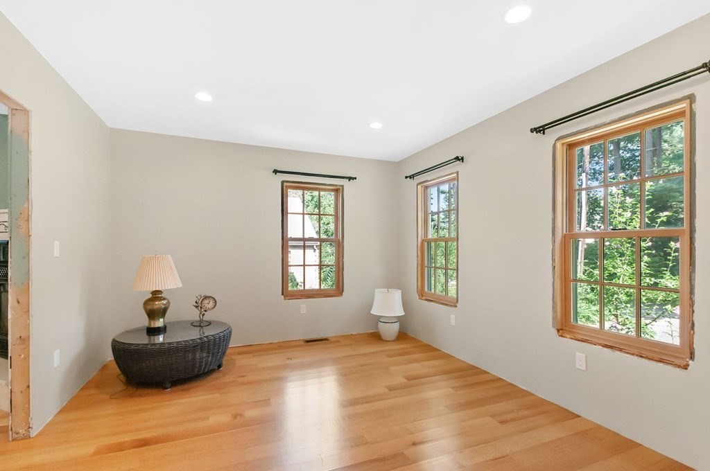 16 Vesta Road Natick, MA 01760 - Photo 12 of 36 a living room with furniture and a window