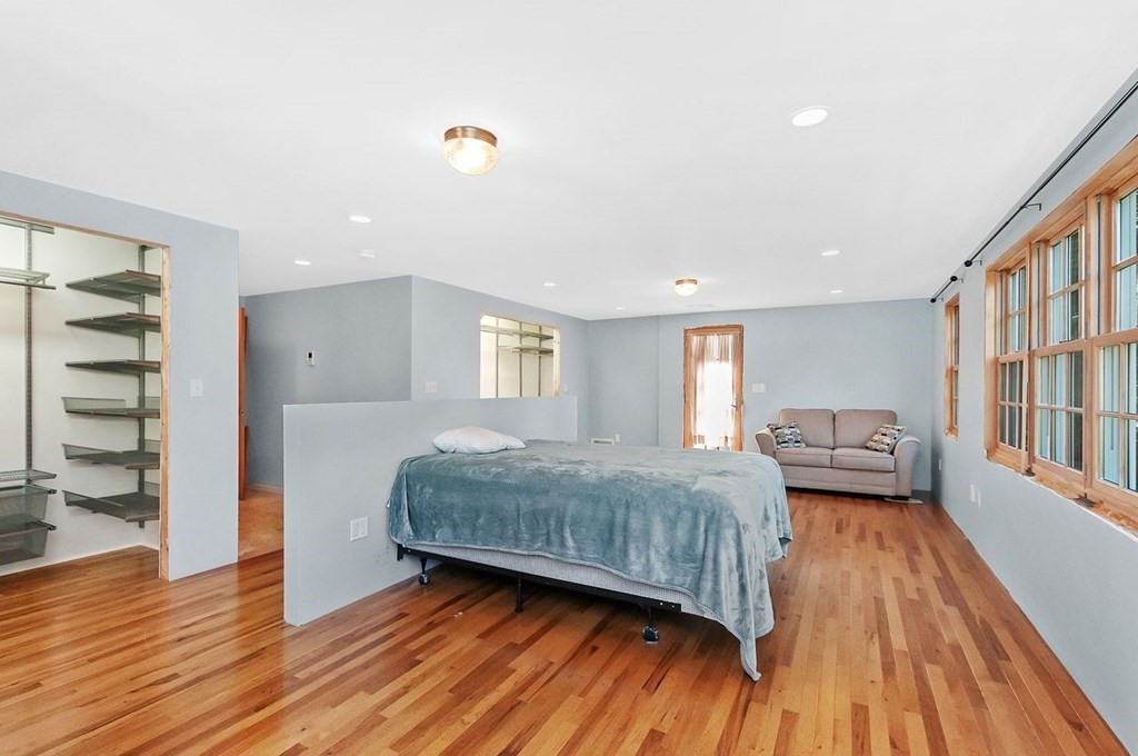 16 Vesta Road Natick, MA 01760 - Photo 15 of 36 a living room with a bed furniture and a window
