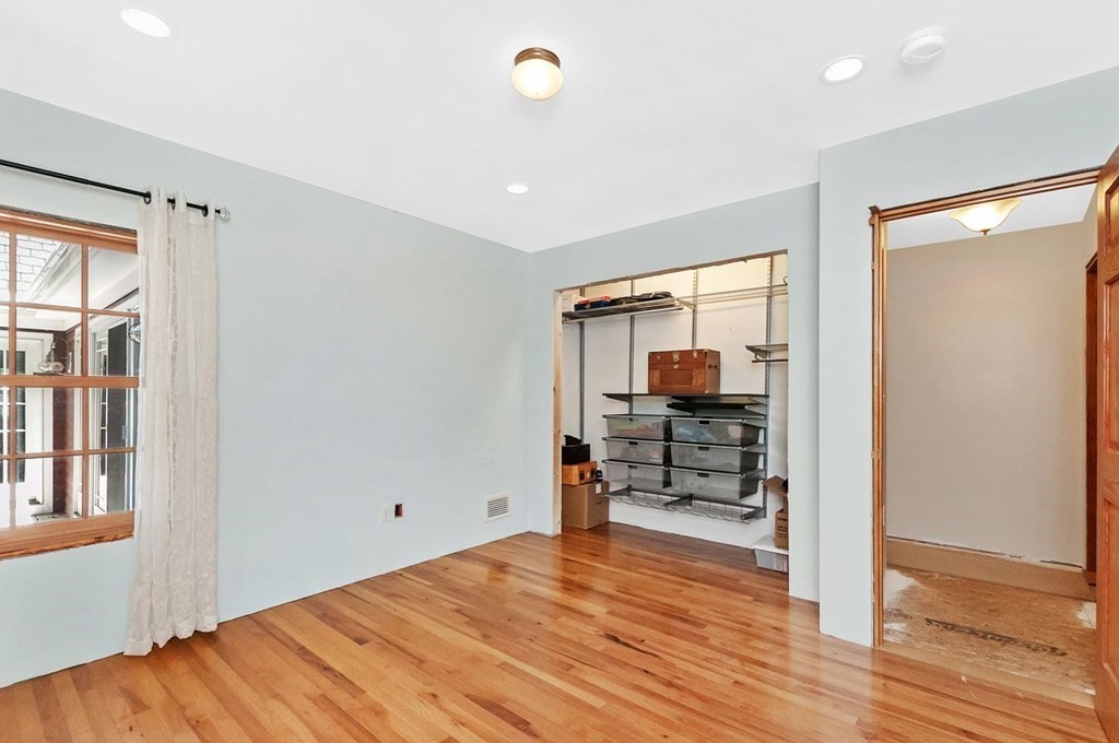 16 Vesta Road Natick, MA 01760 - Photo 23 of 36 a view of a room with wooden floor and a window