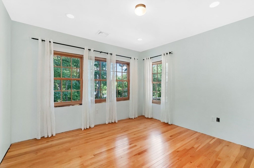 16 Vesta Road Natick, MA 01760 - Photo 24 of 36 a bedroom with a bed and a window