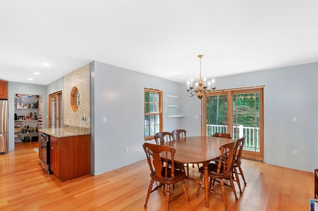 16 Vesta Road Natick, MA 01760 - Photo 6 of 36 a view of a dining room with furniture window and wooden floor