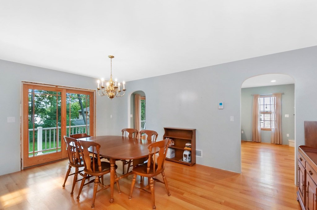 16 Vesta Road Natick, MA 01760 - Photo 7 of 36 a view of a dining room with furniture window and wooden floor