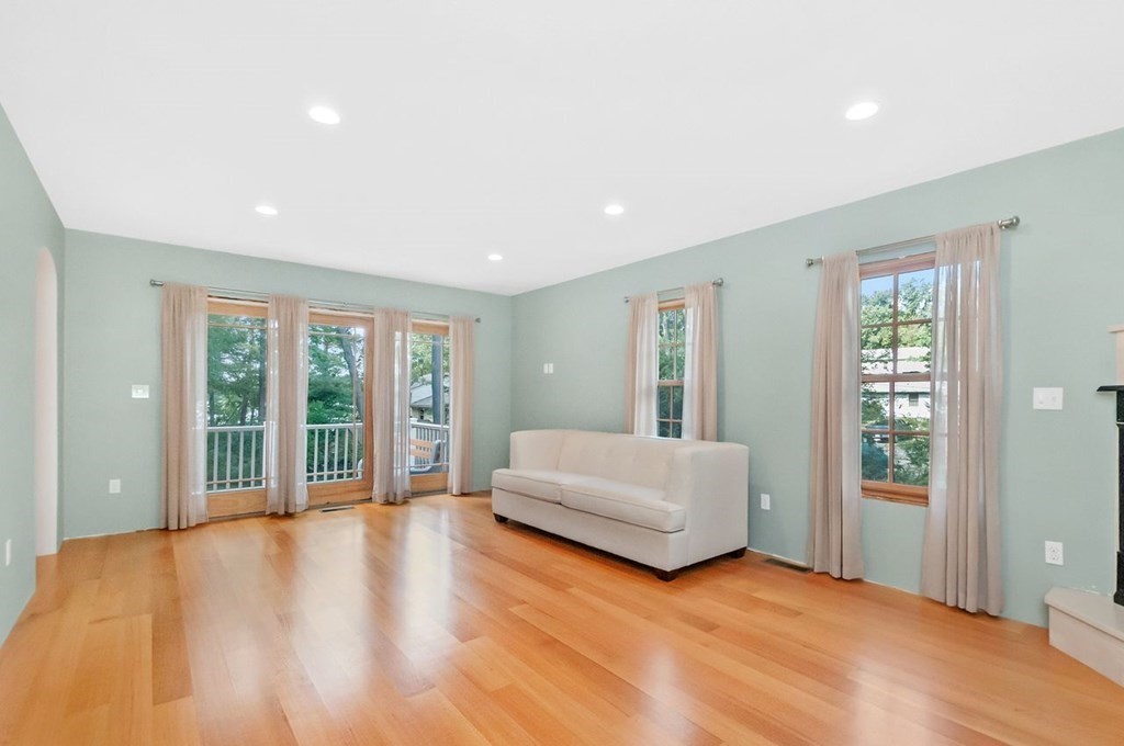 16 Vesta Road Natick, MA 01760 - Photo 10 of 36 a spacious bedroom with a large bed and a large window