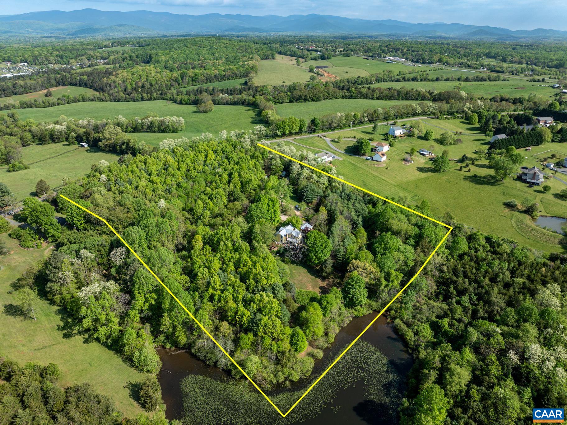 577 Advance Mills Road Ruckersville, VA 22968 - Photo 54 of 59 an aerial view of a yard with lots of green space and mountain view