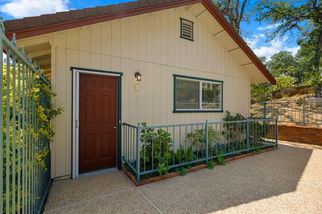 a view of a house with a street