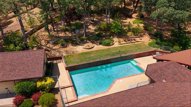 a view of a yard with an outdoor space