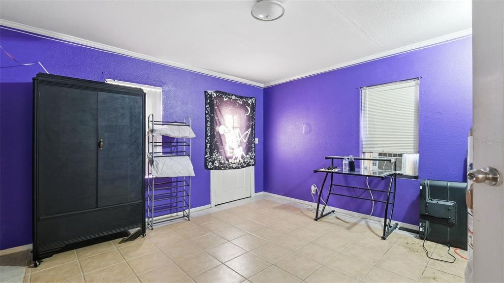 10565 Bessemer Street New Port Richey, FL 34654 - Photo 69 of 72 a workspace with furniture and window