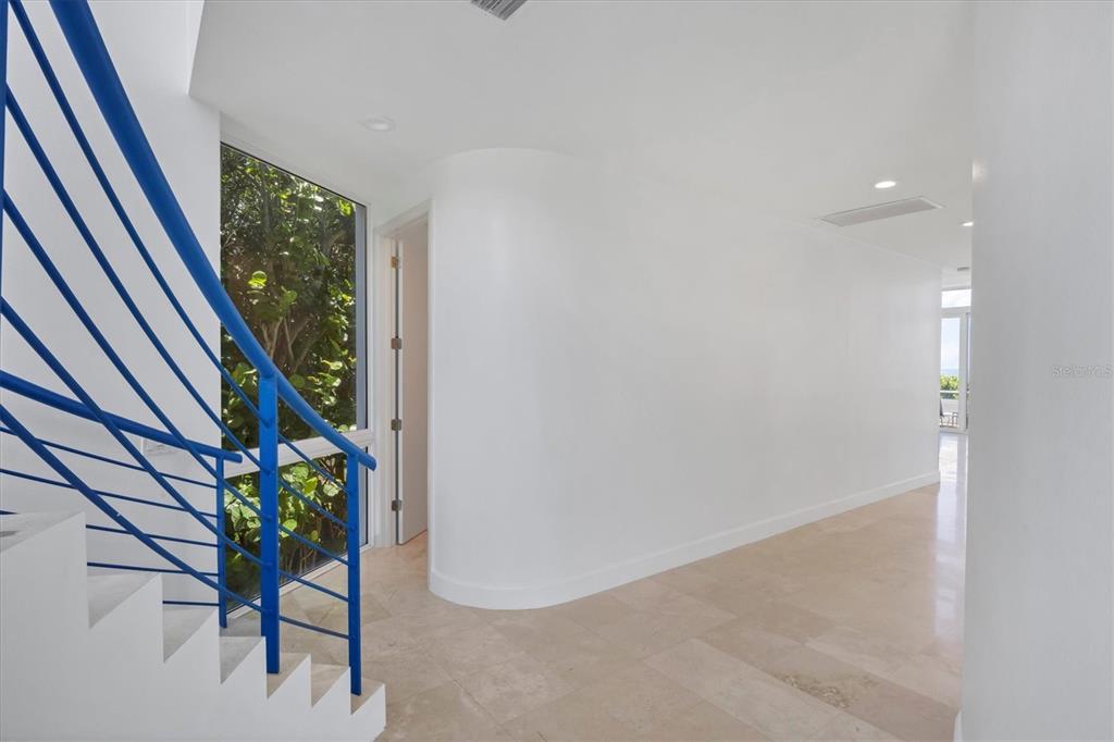 5801 Gulf Of Mexico Drive Longboat Key, FL 34228 - Photo 13 of 52 a view of entryway with a door