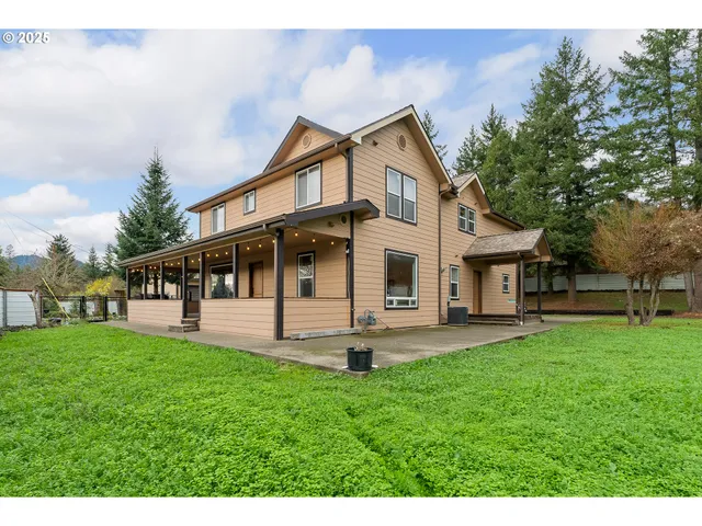 a front view of a house with yard