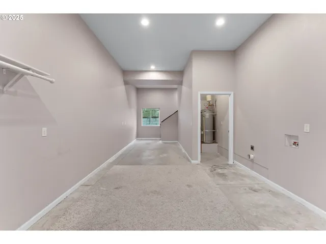 a bathroom with a sink toilet and mirror
