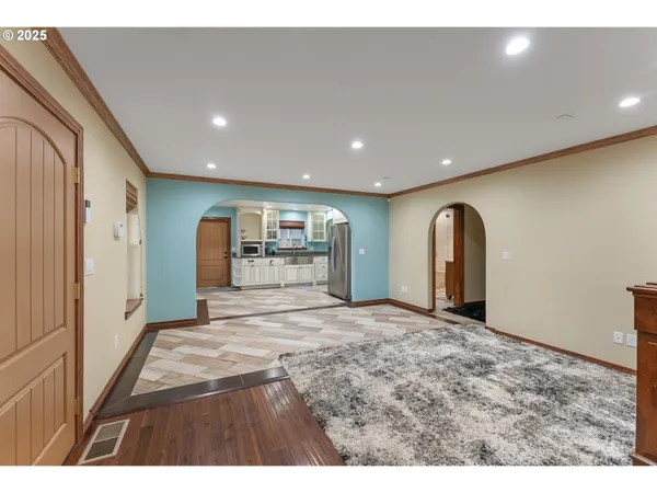 a big room with closet and windows