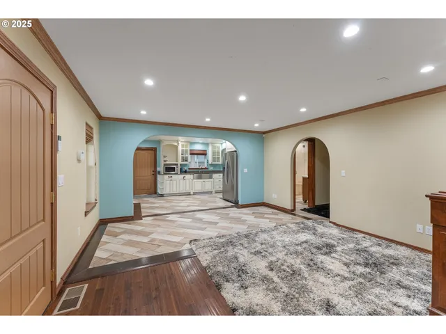 a big room with closet and windows