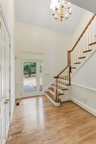 a view of entryway with wooden floor