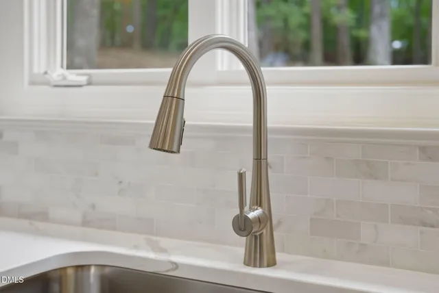 a close view of a bathtub in a bathroom