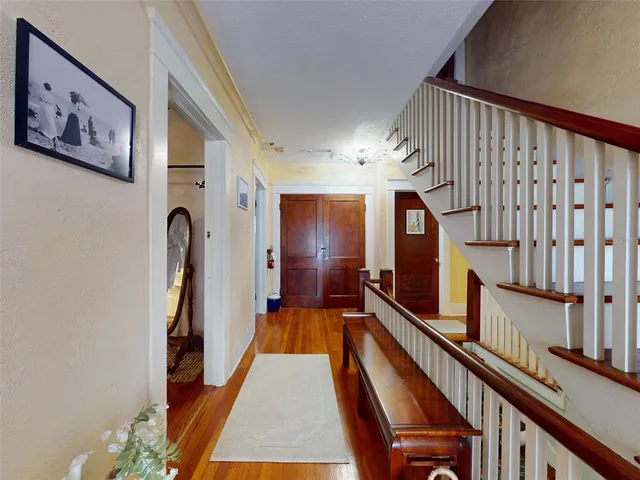 a bedroom with bed and a window