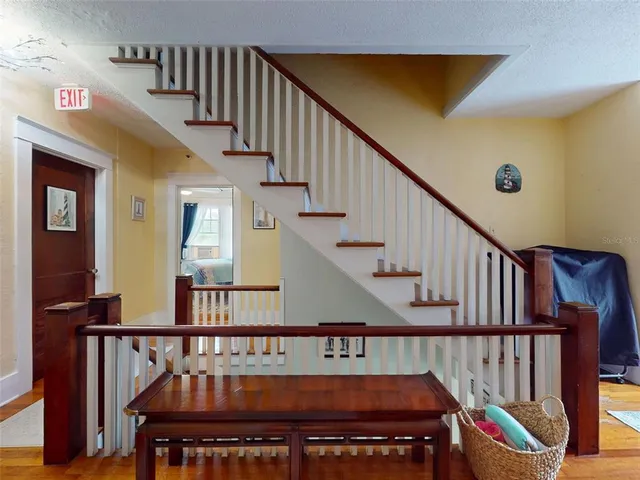a bathroom with a shower and a sink
