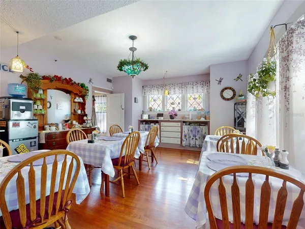 a view of a dining room with furniture window and outside view