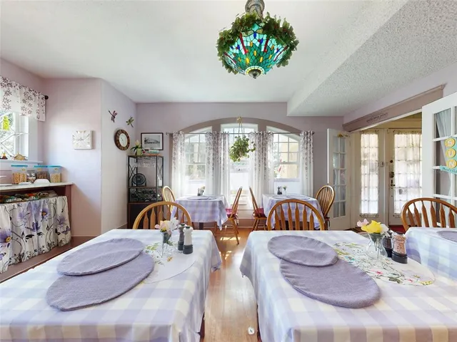 a kitchen with stainless steel appliances granite countertop sink stove and cabinets