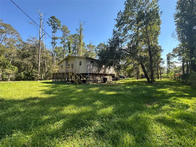 a view of balcony with wooden floor