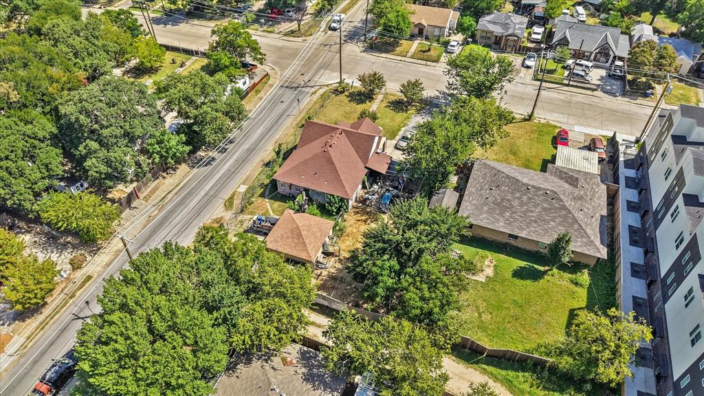 7225 Mohawk Drive Dallas, TX 75235 - Photo 11 of 16 an aerial view of residential house with outdoor space and swimming pool