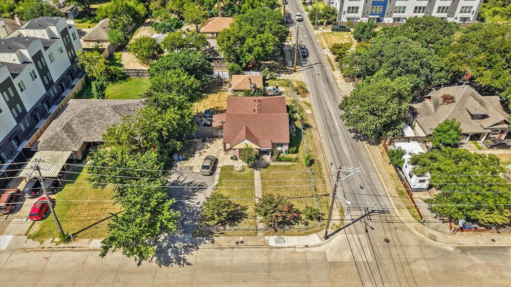 7225 Mohawk Drive Dallas, TX 75235 - Photo 14 of 16 an aerial view of residential houses with outdoor space and trees