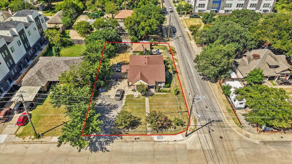 7225 Mohawk Drive Dallas, TX 75235 - Photo 4 of 16 an aerial view of residential houses with outdoor space