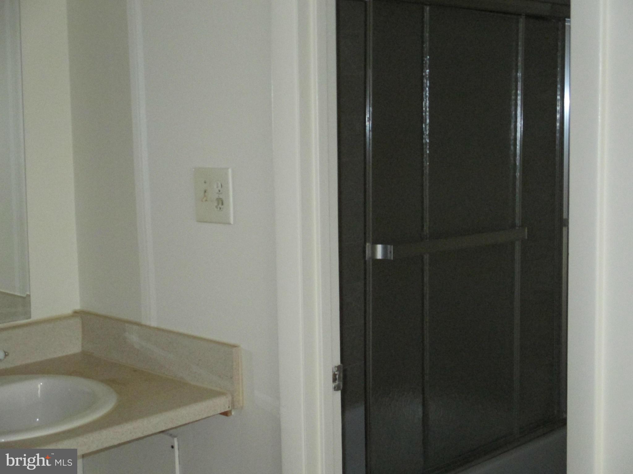 6260 Edsall Road, Unit 403 Alexandria, VA 22312 - Photo 12 of 15 a bathroom with a sink and shower