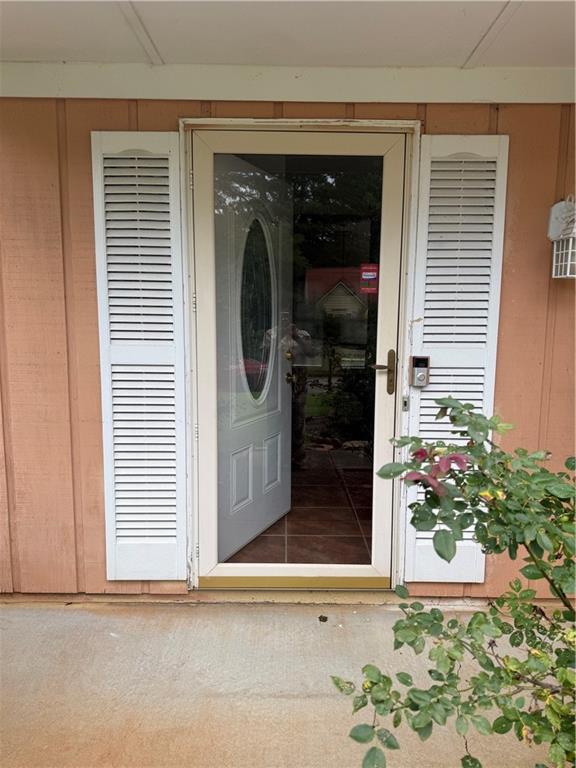 682 Bridge Way Lithonia, GA 30058 - Photo 2 of 25 a view of a door and a window