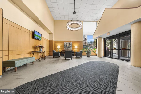 a living room with furniture and a couch