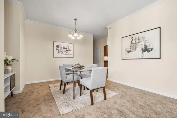 a living room with furniture wooden floor and a fireplace