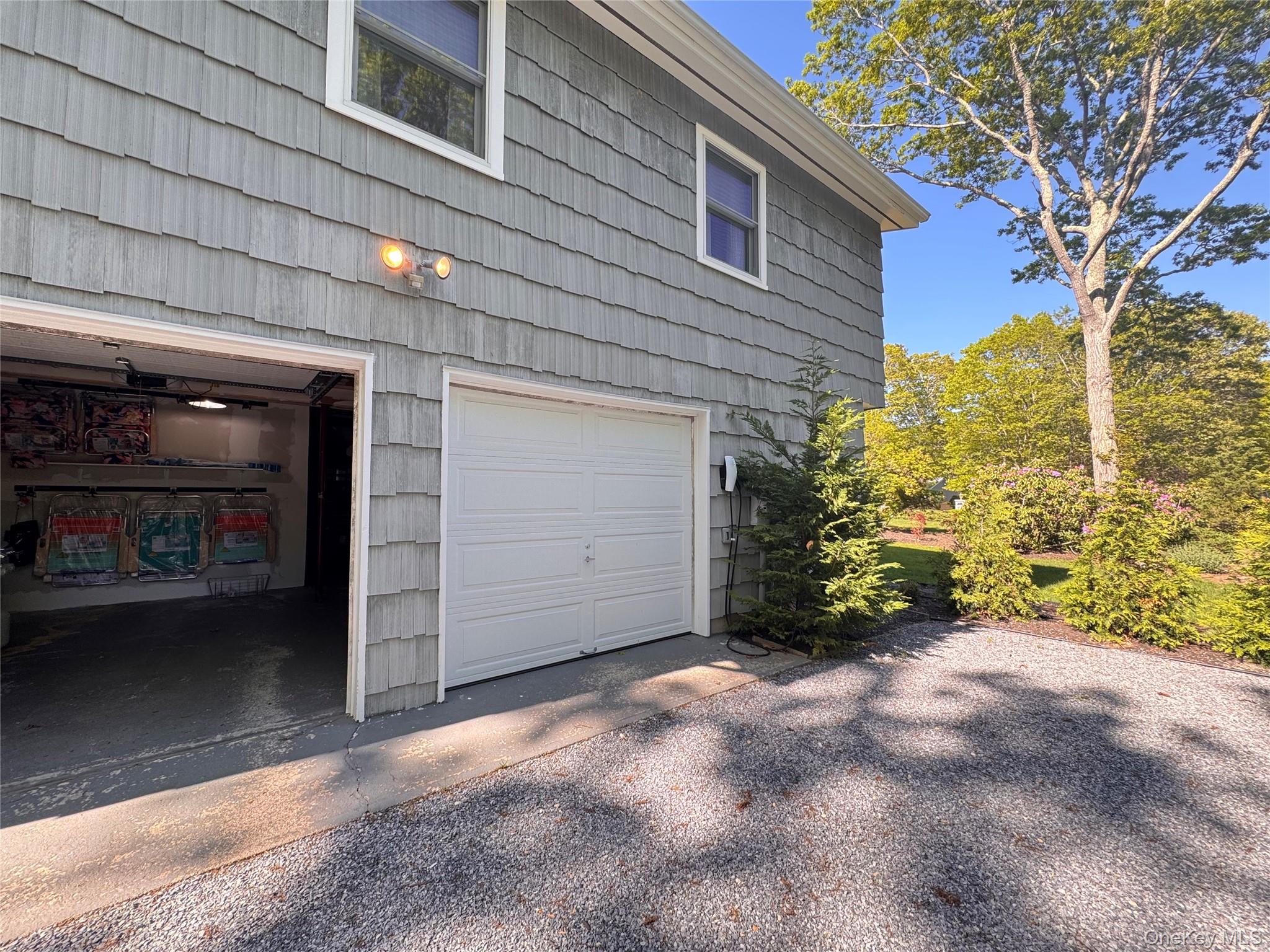 3 Debbie Trail Hampton Bays, NY 11946 - Photo 14 of 29 View of garage
