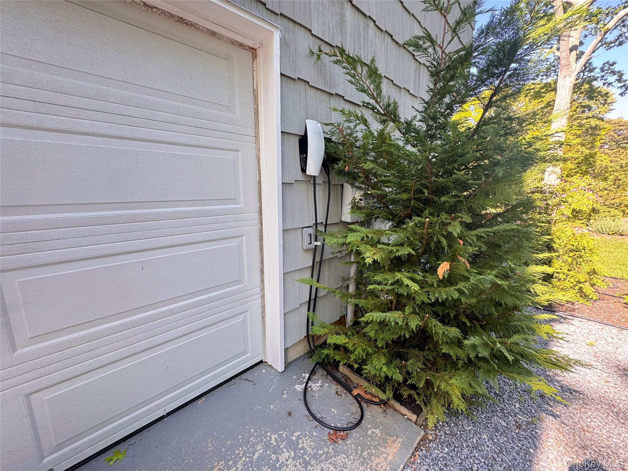 3 Debbie Trail Hampton Bays, NY 11946 - Photo 15 of 29 View of garage