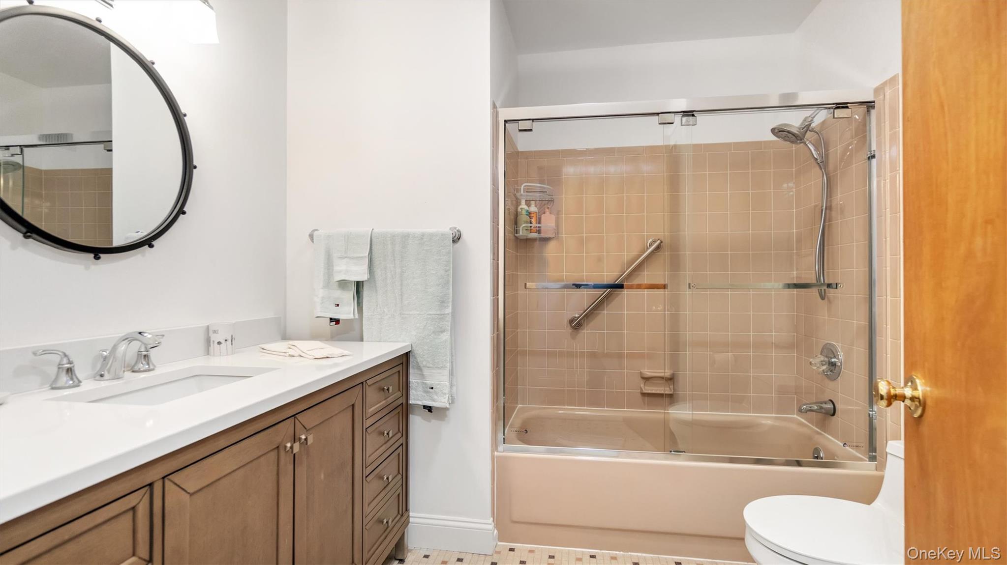 3 Debbie Trail Hampton Bays, NY 11946 - Photo 29 of 29 Bathroom with toilet, vanity, and bathtub / shower combination