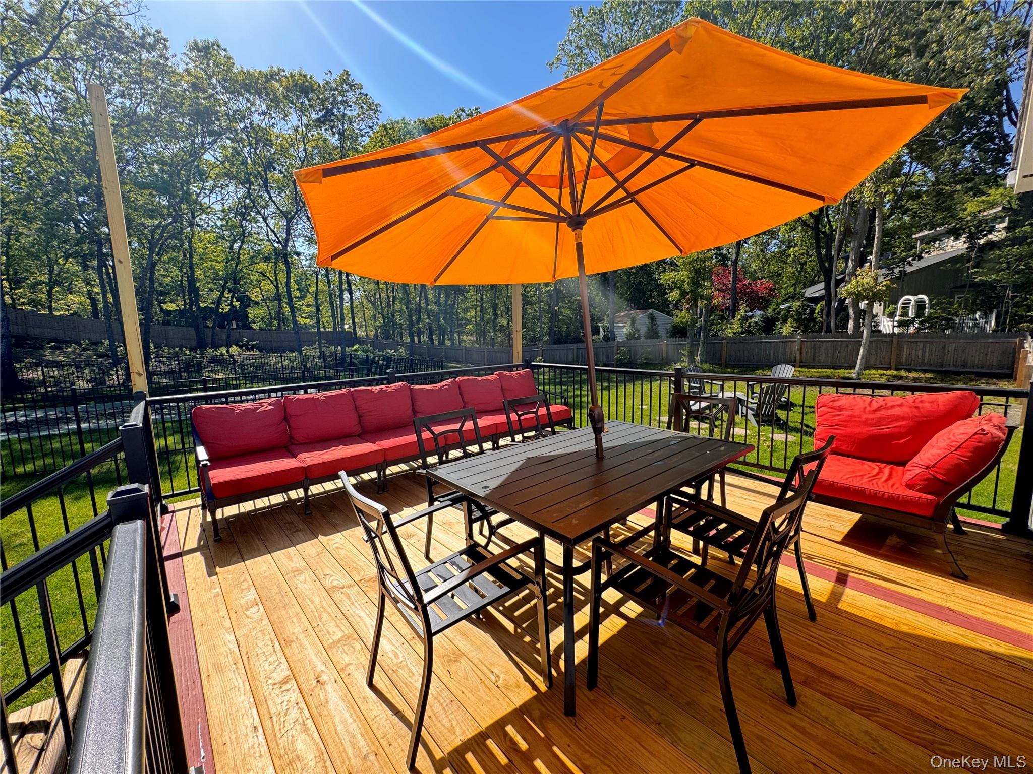 3 Debbie Trail Hampton Bays, NY 11946 - Photo 7 of 29 Deck featuring outdoor lounge area and outdoor dining area