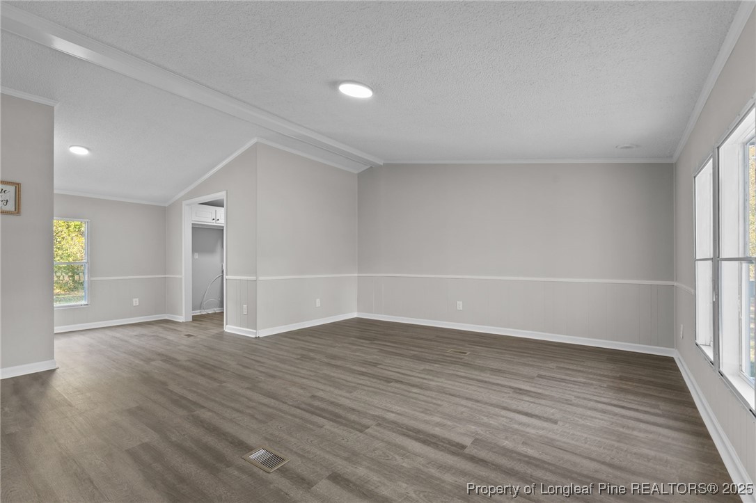 5888 Butler Nursery Road Fayetteville, NC 28306 - Photo 25 of 42 wooden floor in an empty room with a window