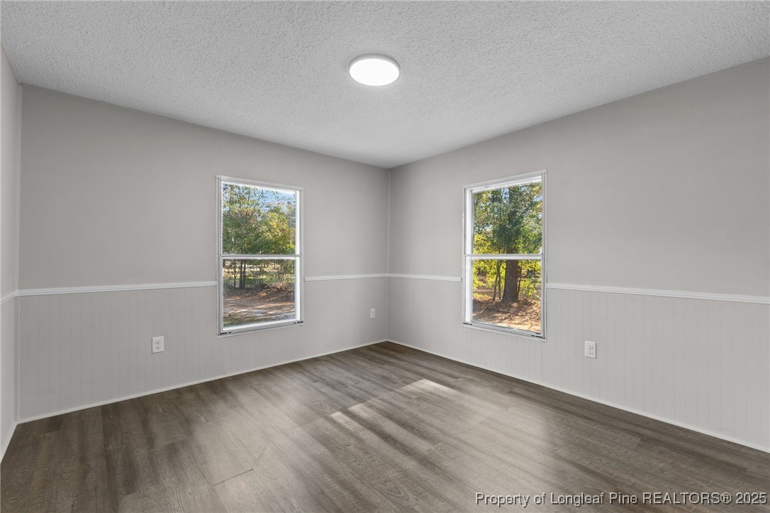 5888 Butler Nursery Road Fayetteville, NC 28306 - Photo 31 of 42 an empty room with windows